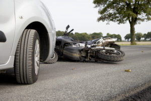 fallen motorcycle in road